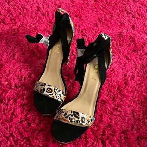 Size 8.5 floral platform shoes.